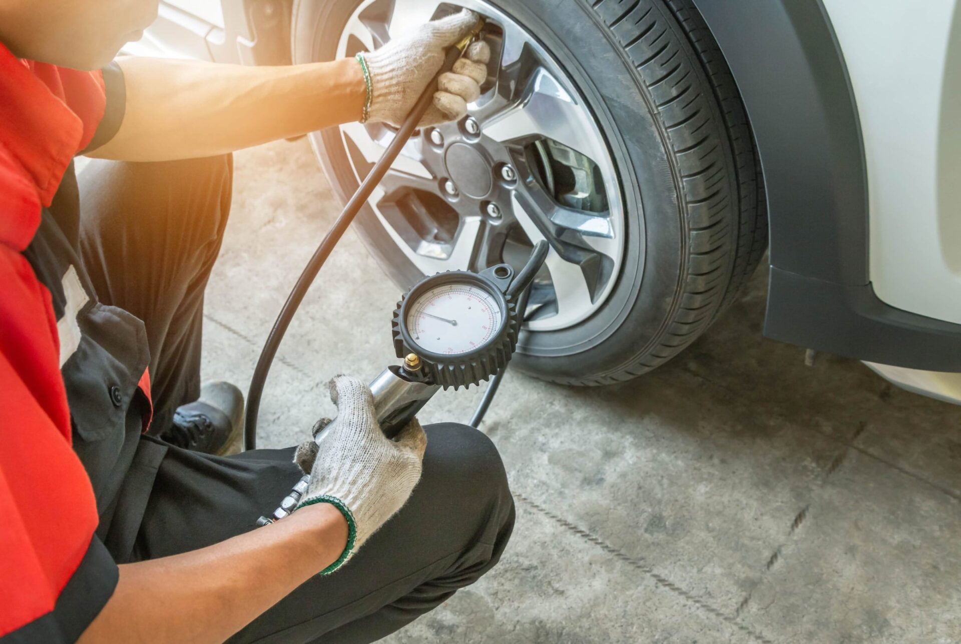 checking tire pressure stock
